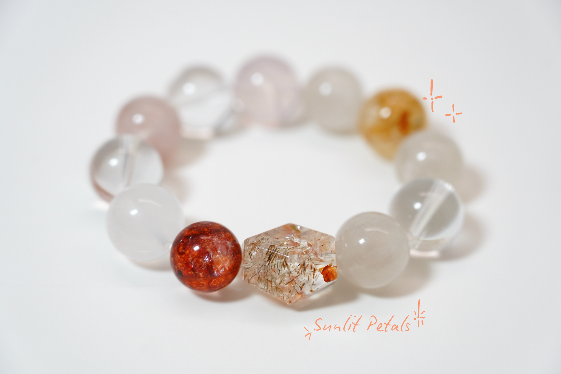 crystal bracelet with multicolored beads on a white background